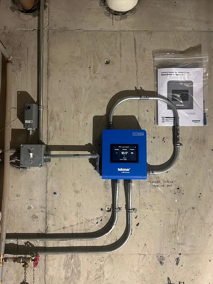 Completed tekmar smart boiler control installation by PeakFlow Plumbing Calgary