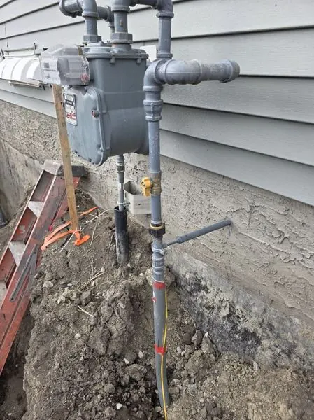 Gas meter close-up by PeakFlow Plumbing Calgary