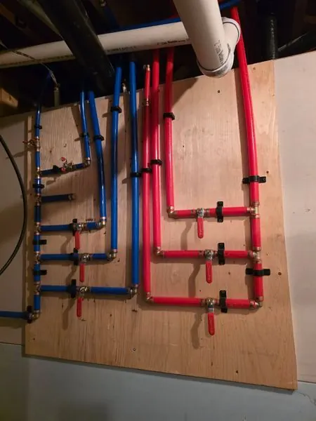 PEX manifold board - whole home re-pipe by PeakFlow Plumbing Calgary